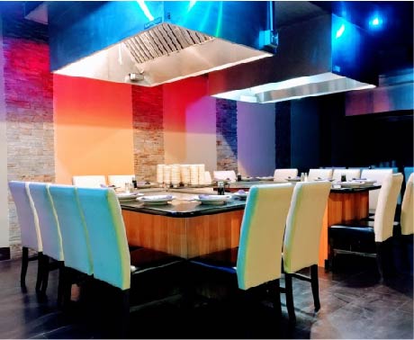 Hibachi grill with colorful lighting